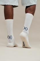 أوو™ جورب تحت الماء كريمي أبيض